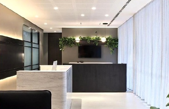 Reception counter and full-height curtains